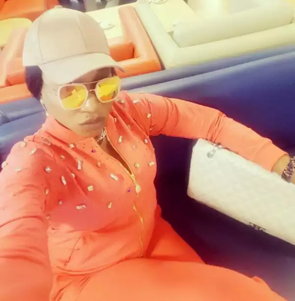 Nollywood Actress, Oge Okoye Looks Beautiful In Pink Outfit As She Jets Off To Los Angeles